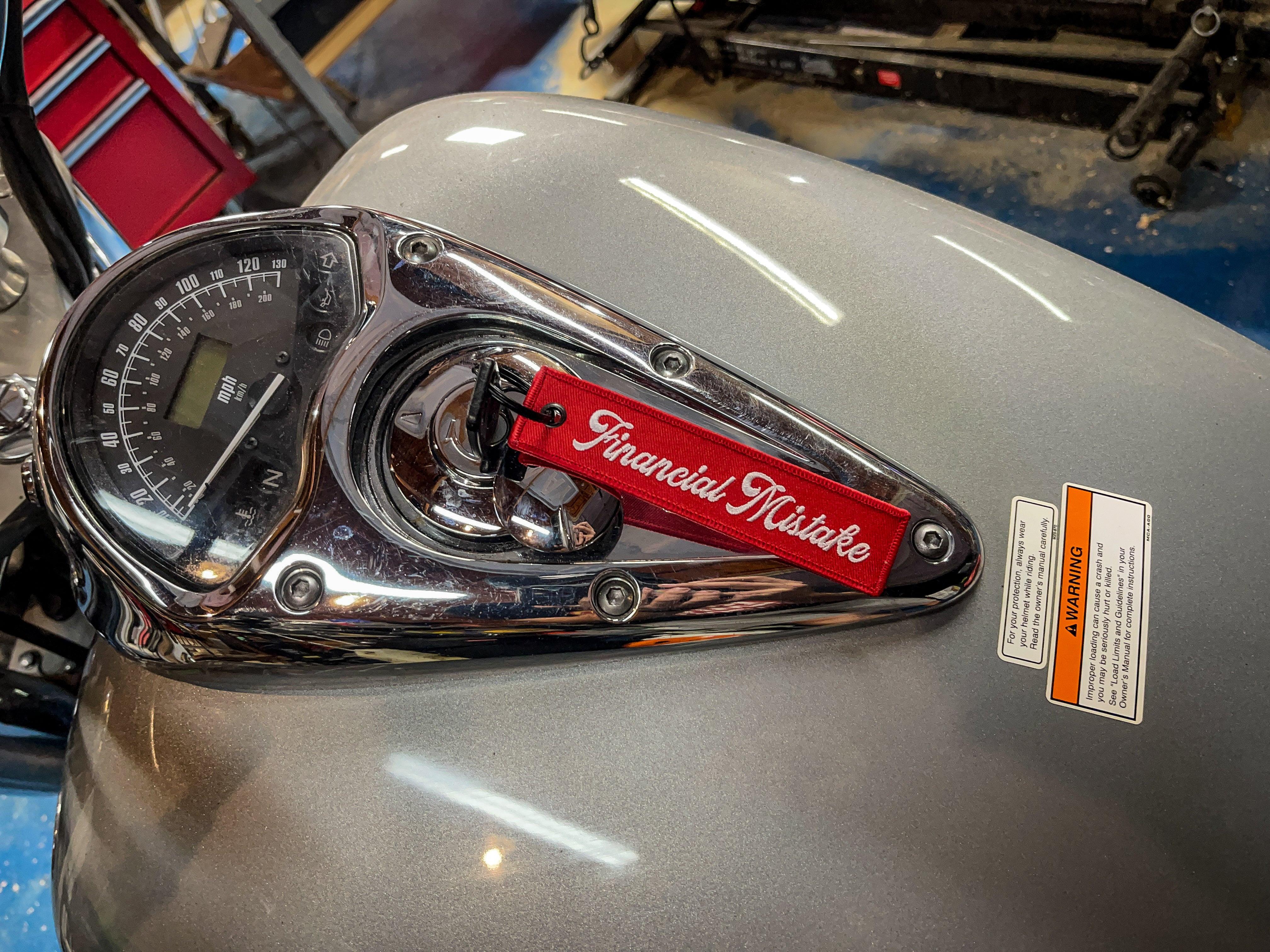 Financial Mistake Jet Tag Keychain | Red |.