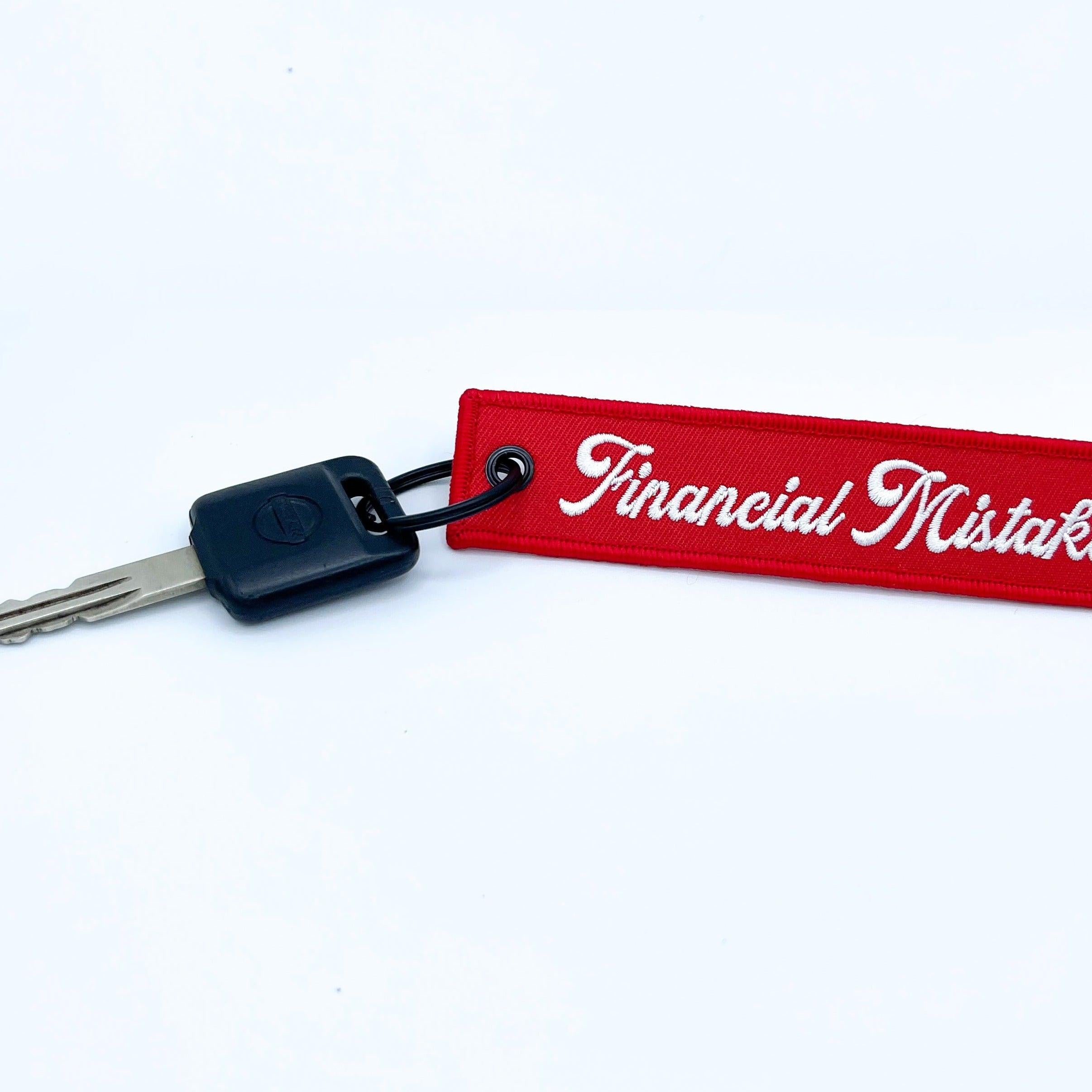 Financial Mistake Jet Tag Keychain | Red |.